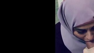 Arabian hijab-wearing missus sucks her lover's fat dick