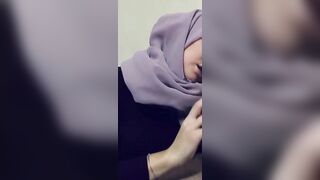 Arabian hijab-wearing missus sucks her lover's fat dick