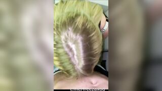 A busty Russian woman with a tattoo on her neck sucks the dick of a stranger who films her on a smartphone