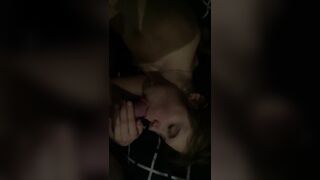 A naked 20-year-old Russian woman sucks off her lover's cock, who takes pictures of her on her smartphone