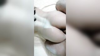 Tattooed man has a girl with an appetizing ass on the bed from behind