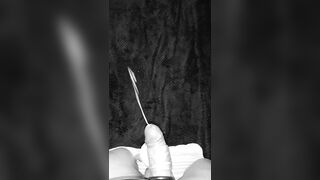 A man with a ring on his penis jerks off to a naked roommate and cums profusely on her